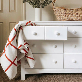 White 6 drawer dresser in nursery