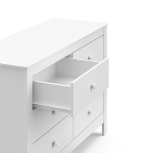 Close-up view of White 6 drawer dresser with open drawer 
