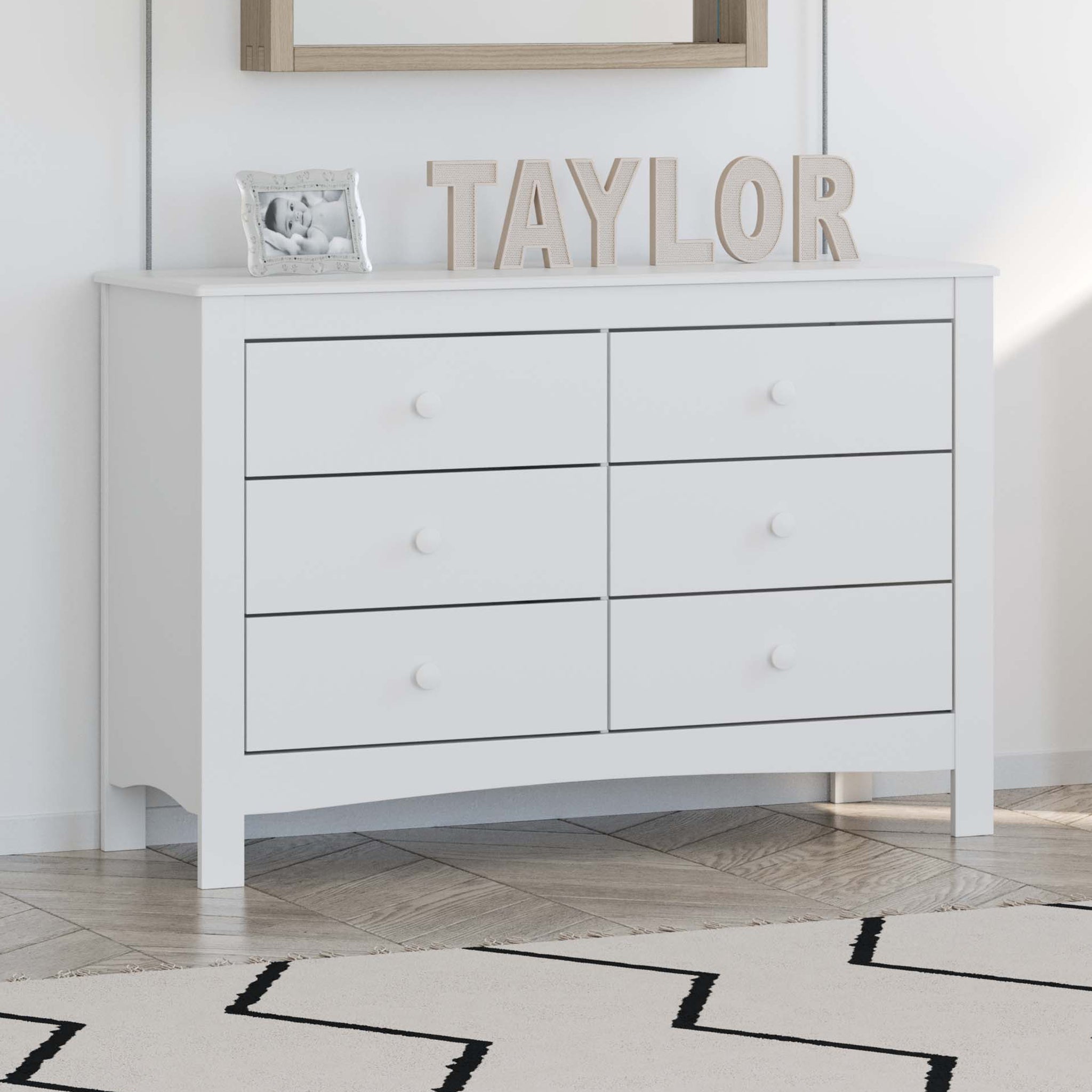 White 6 drawer dresser in nursery