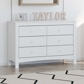 White 6 drawer dresser in nursery