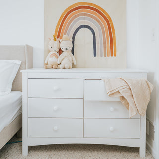 White 6 drawer dresser in nursery