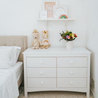 White 6 drawer dresser in nursery