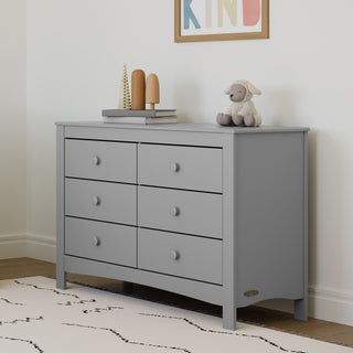 Pebble gray 6 drawer dresser in nursery