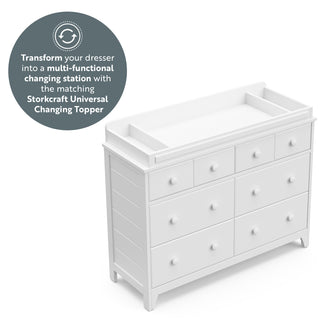Front view of white 6 drawer dresser with changing topper graphic
