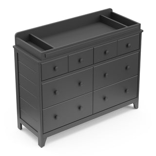 gray changing topper on top of 6 drawer dresser 