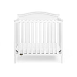 Graco® Stella 4-in-1 Convertible Mini Crib with Bonus Water-Resistant Mattress.