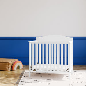 White crib in nursery