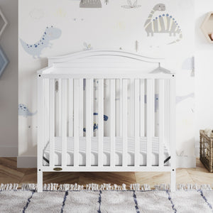 White crib in nursery