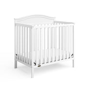 Stella 4-in-1 Convertible Mini Crib with Bonus Water-Resistant Mattress