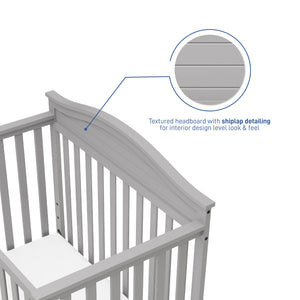 pebble gray crib features graphic