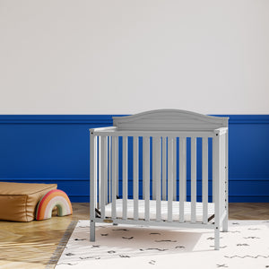 Pebble gray crib in nursery