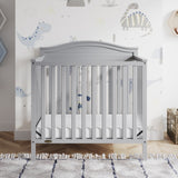 Graco® Stella 4-in-1 Convertible Mini Crib with Bonus Water-Resistant Mattress.