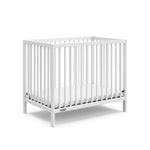 white mini crib angled view