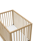 Graco® Teddi® 4-in-1 Convertible Mini Crib with Bonus Water-Resistant Mattress.