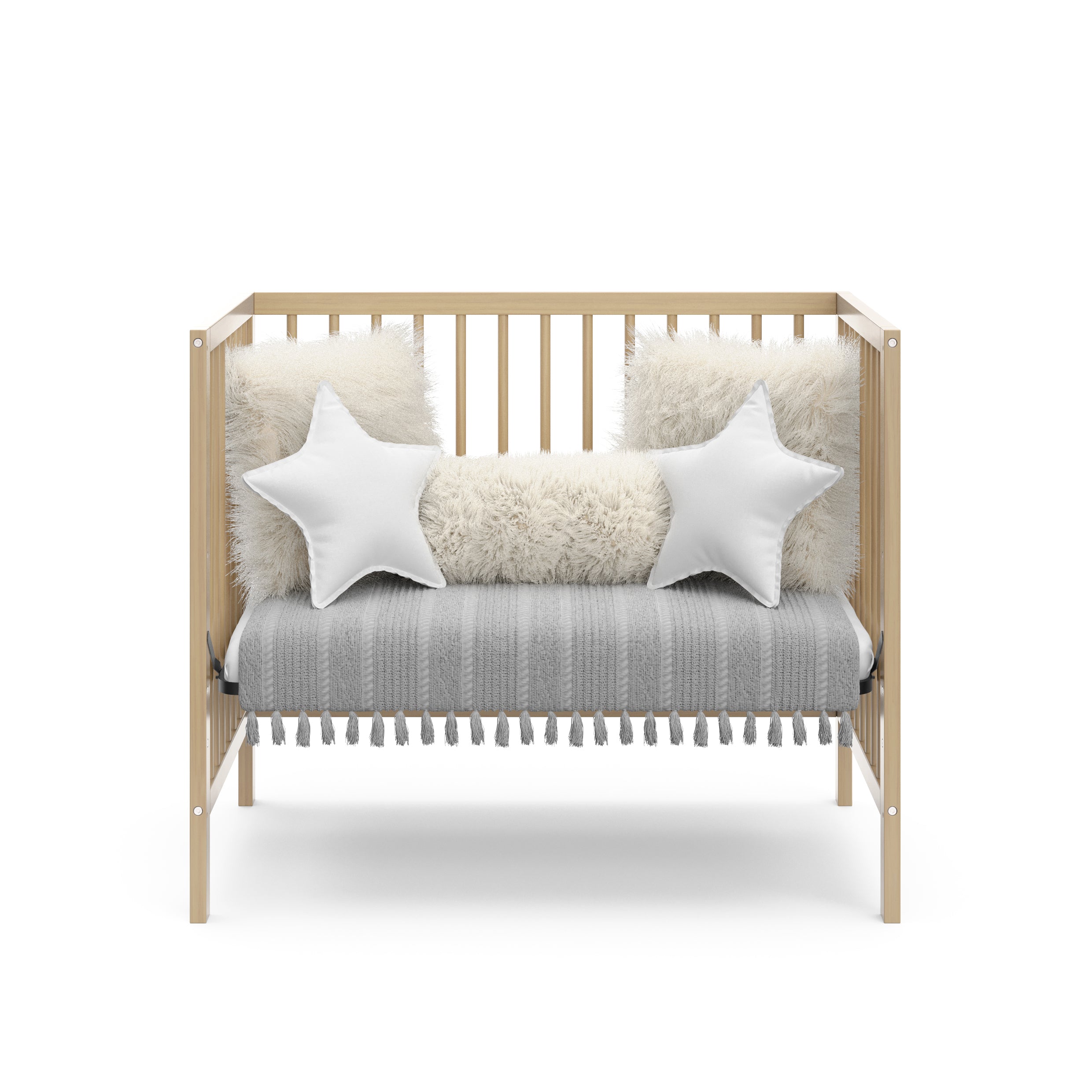 Graco® Teddi® 4-in-1 Convertible Mini Crib with Bonus Water-Resistant Mattress.