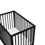Graco® Teddi® 4-in-1 Convertible Mini Crib with Bonus Water-Resistant Mattress.