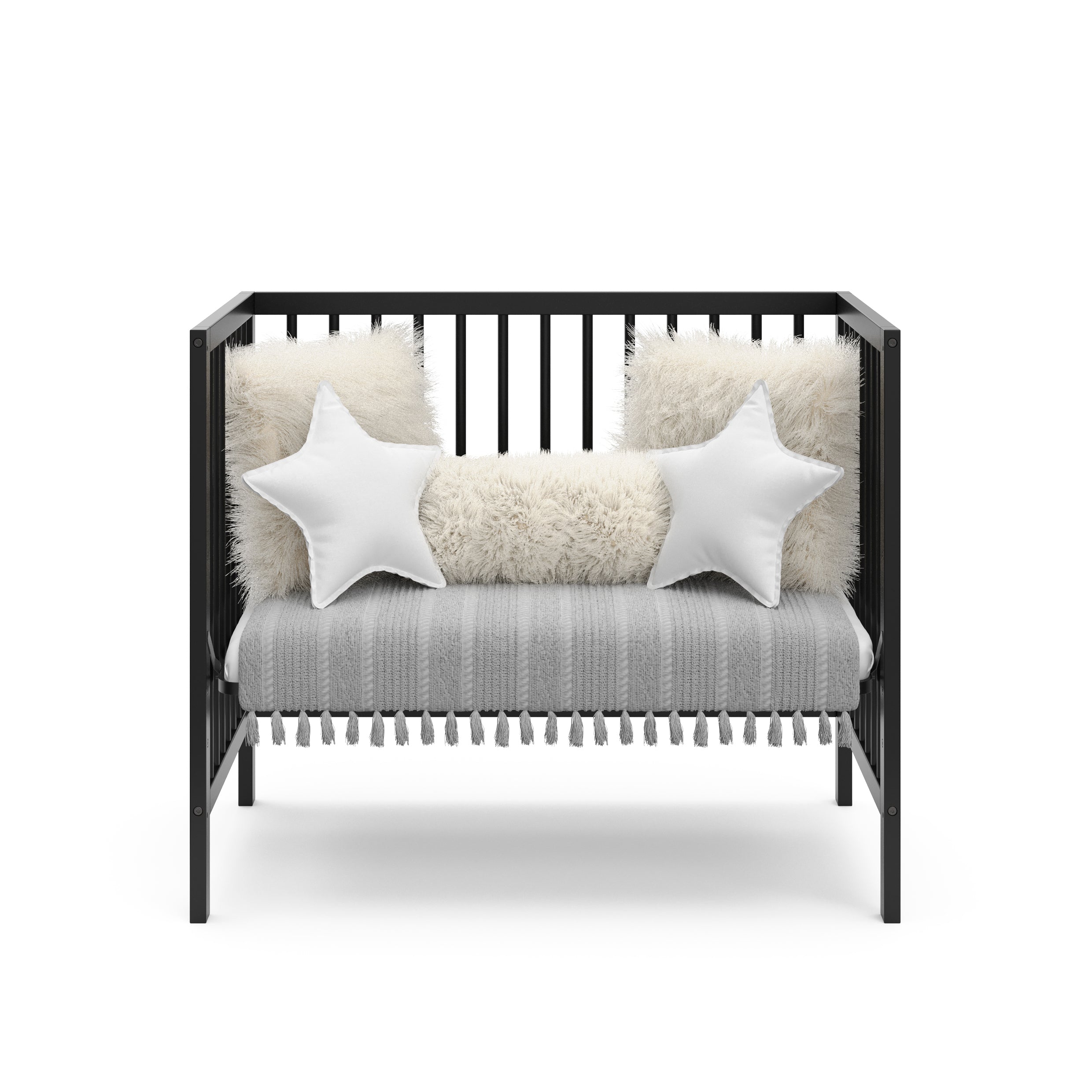 Graco® Teddi® 4-in-1 Convertible Mini Crib with Bonus Water-Resistant Mattress.