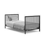 Graco® Teddi® 4-in-1 Convertible Mini Crib with Bonus Water-Resistant Mattress.