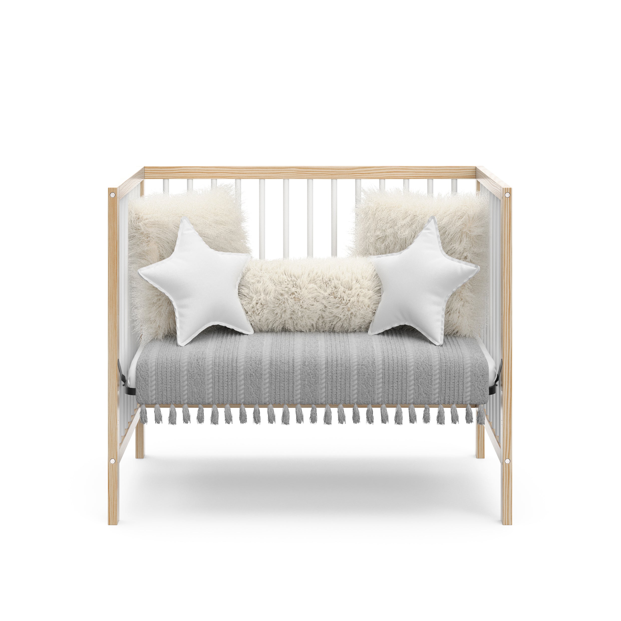 Graco® Teddi® 4-in-1 Convertible Mini Crib with Bonus Water-Resistant Mattress.