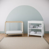 Graco® Teddi® 4-in-1 Convertible Mini Crib with Bonus Water-Resistant Mattress.