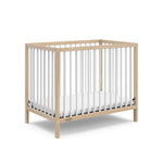 Graco® Teddi® 4-in-1 Convertible Mini Crib with Bonus Water-Resistant Mattress.