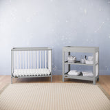 Graco® Teddi® 4-in-1 Convertible Mini Crib with Bonus Water-Resistant Mattress.