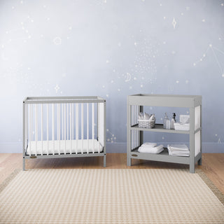 pebble gray with white mini crib in nursery