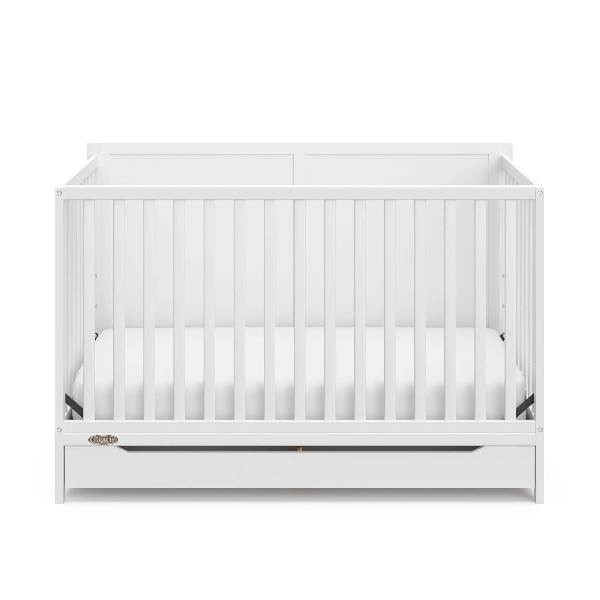 front view of white crib with drawer