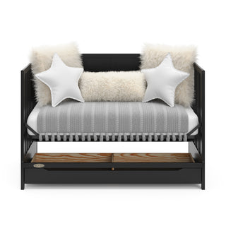 black crib with drawer in a daybed conversion