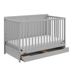 pebble gray crib with open drawer