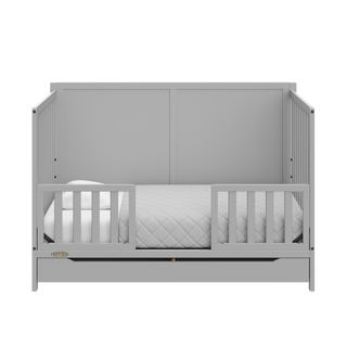 pebble gray crib with drawer in toddler bed conversion with two toddler safety guardrail