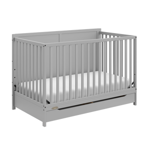 pebble gray crib with drawer angled view