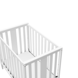 white close-up view of white crib