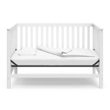 White crib in daybed conversion