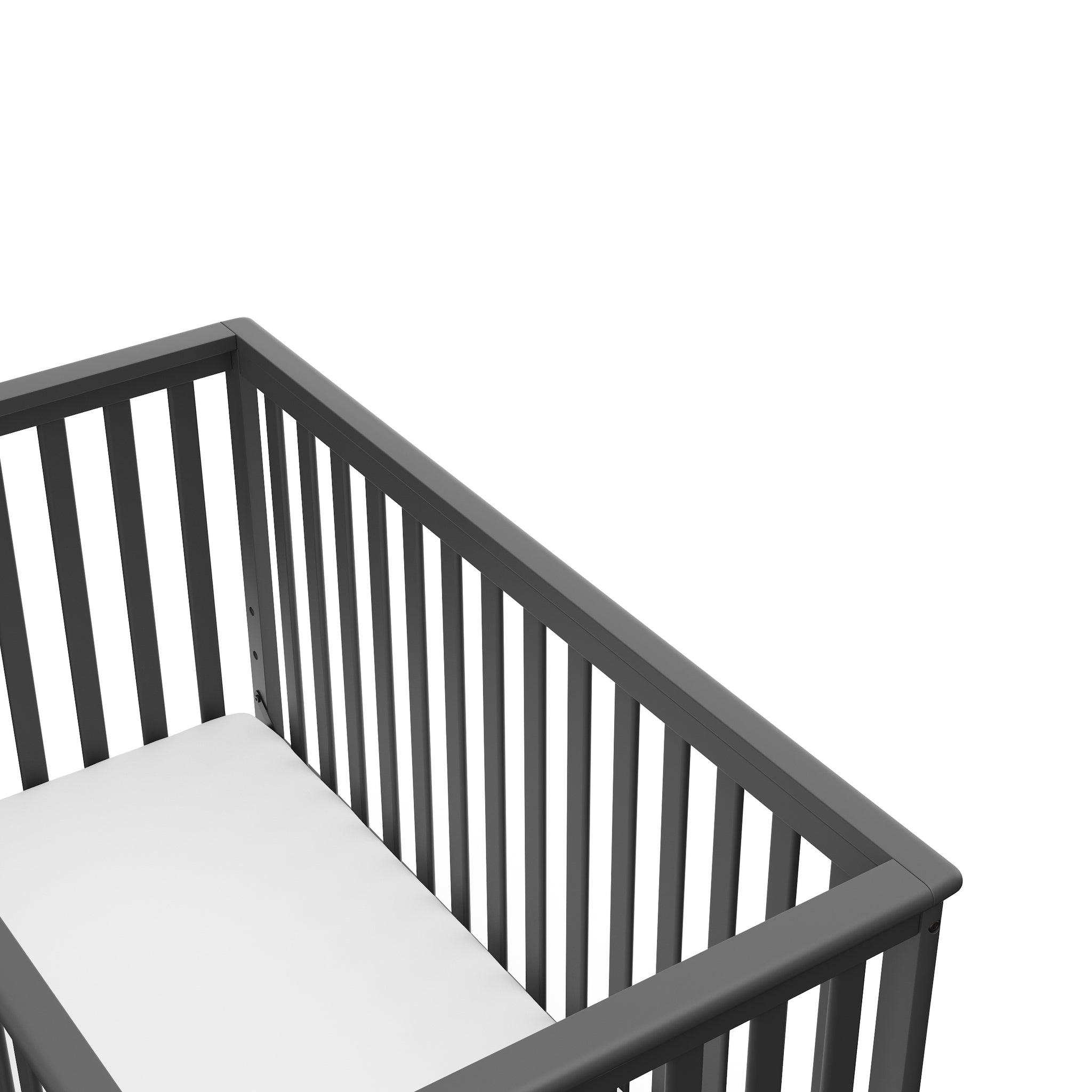 Close-up view of gray crib's headboard