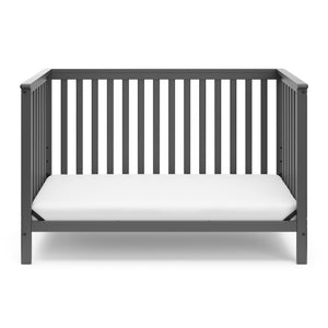 gray crib in toddler bed conversion