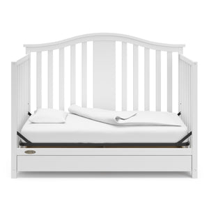 White crib with drawer in daybed conversion