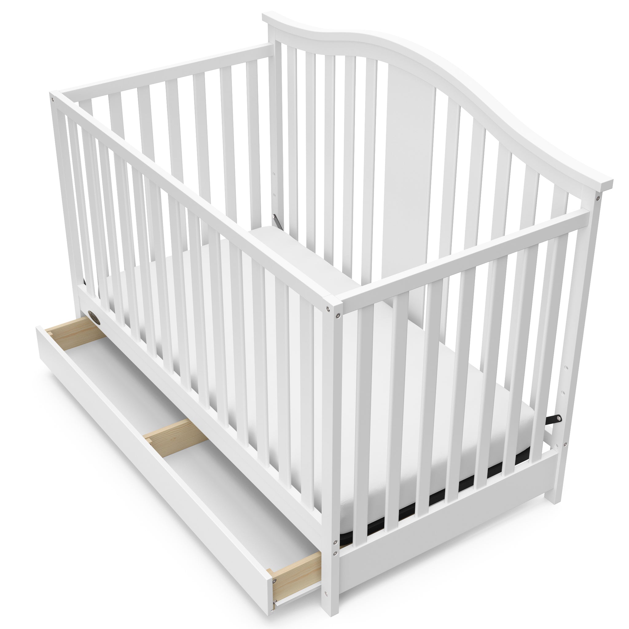 White crib with open drawer angled