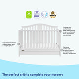 White crib with drawer features graphic