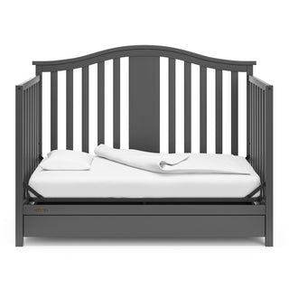 gray crib with drawer in daybed conversion