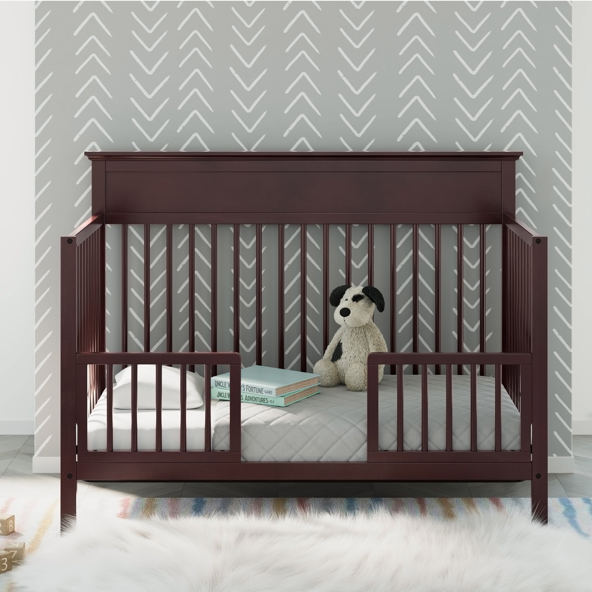 espresso crib in toddler bed conversion with guardrails, in nursery