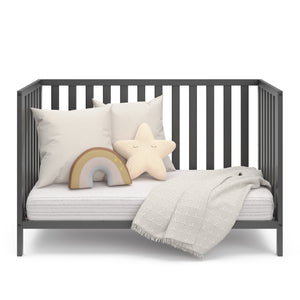 gray crib in daybed conversion