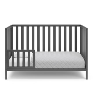 gray crib in toddler bed conversion