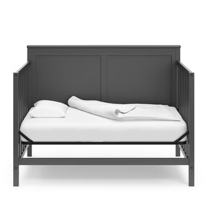gray crib in daybed conversion