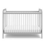 Front view of white crib with pebble gray 
