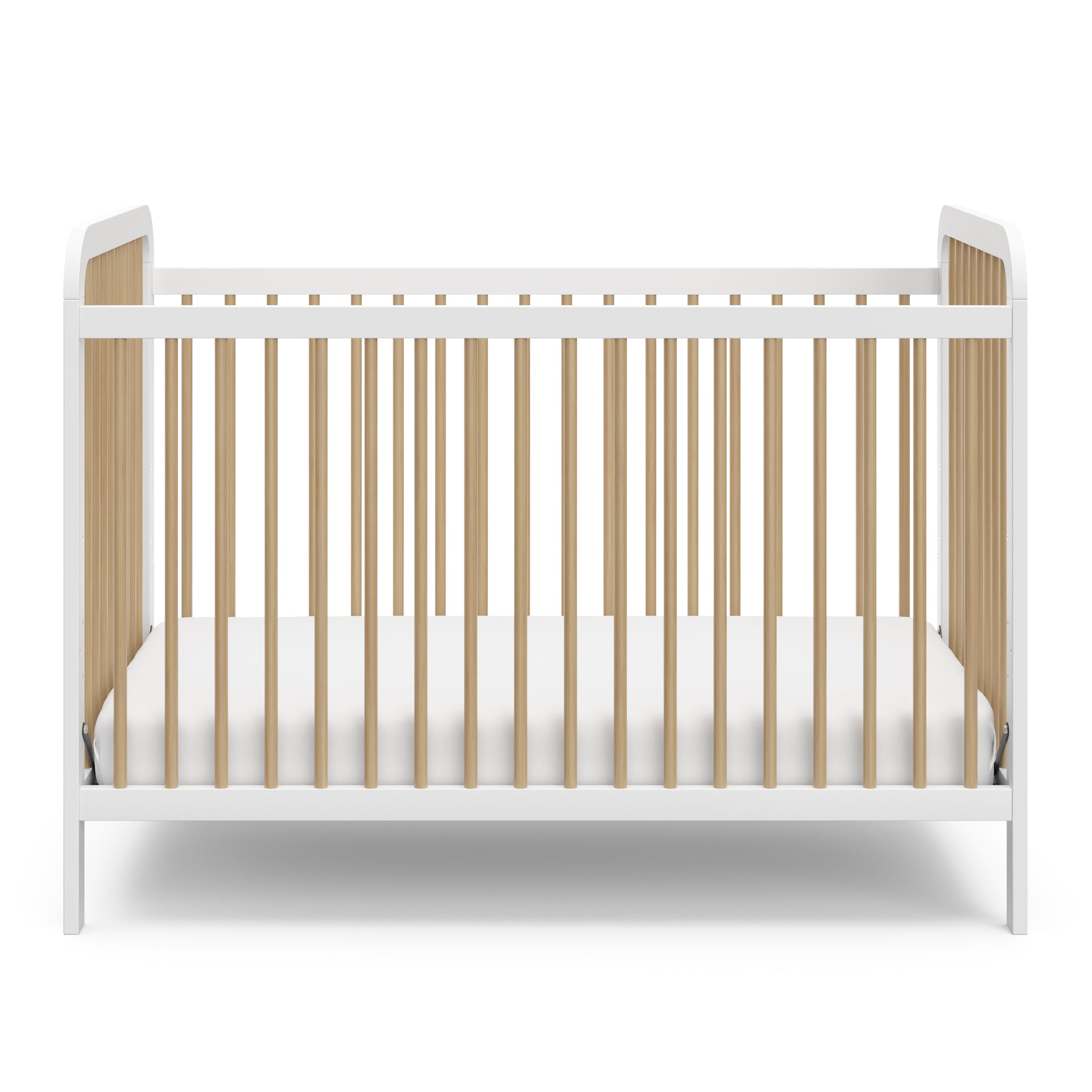 Front view of white crib with driftwood 