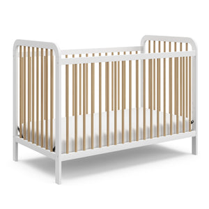 white crib with driftwood angled 
