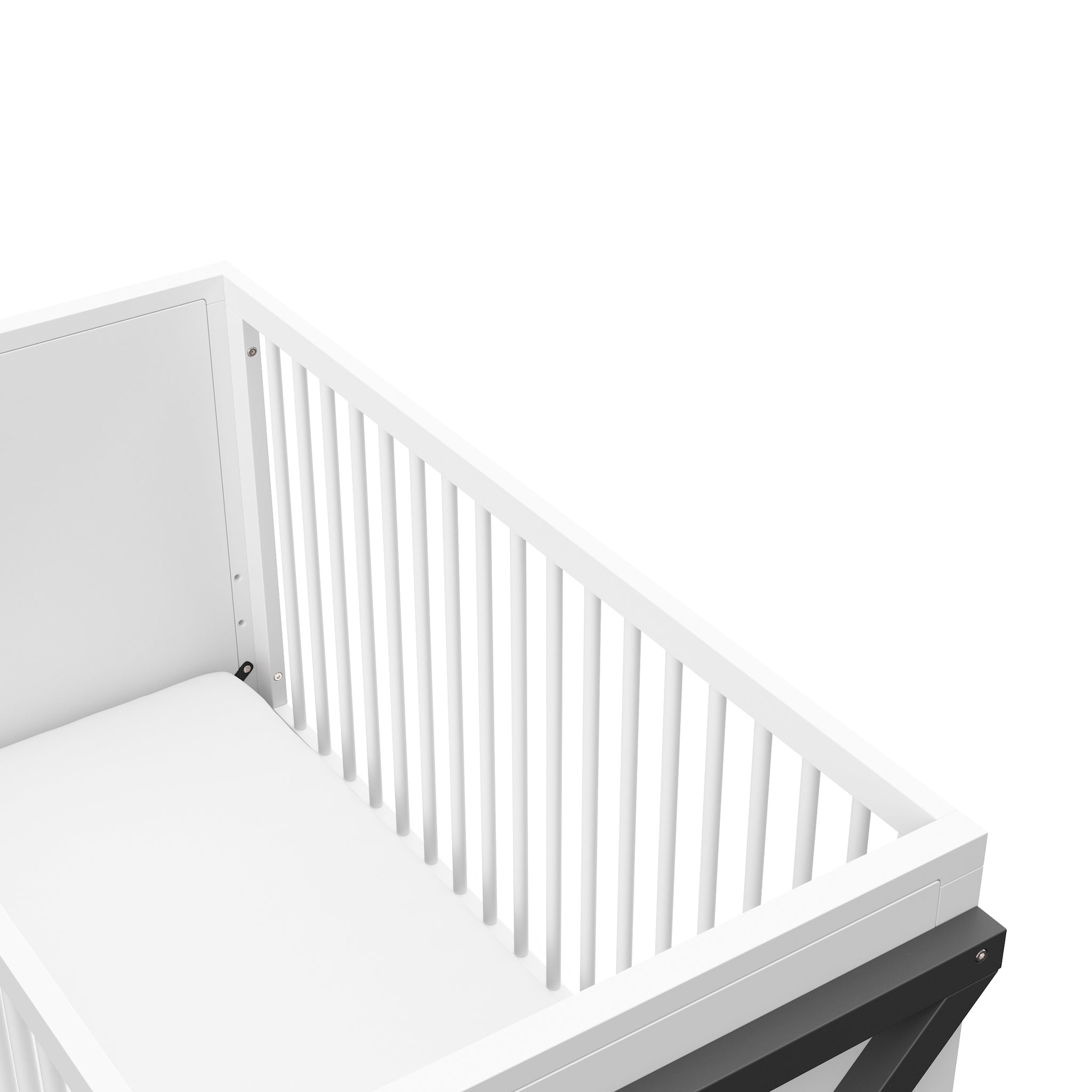 Close-up view of white with gray crib's headboard