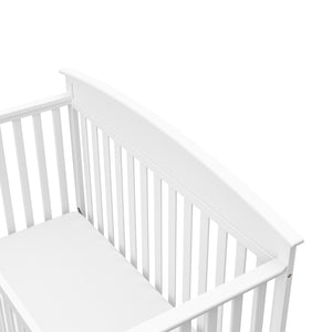 Close-up view of white crib