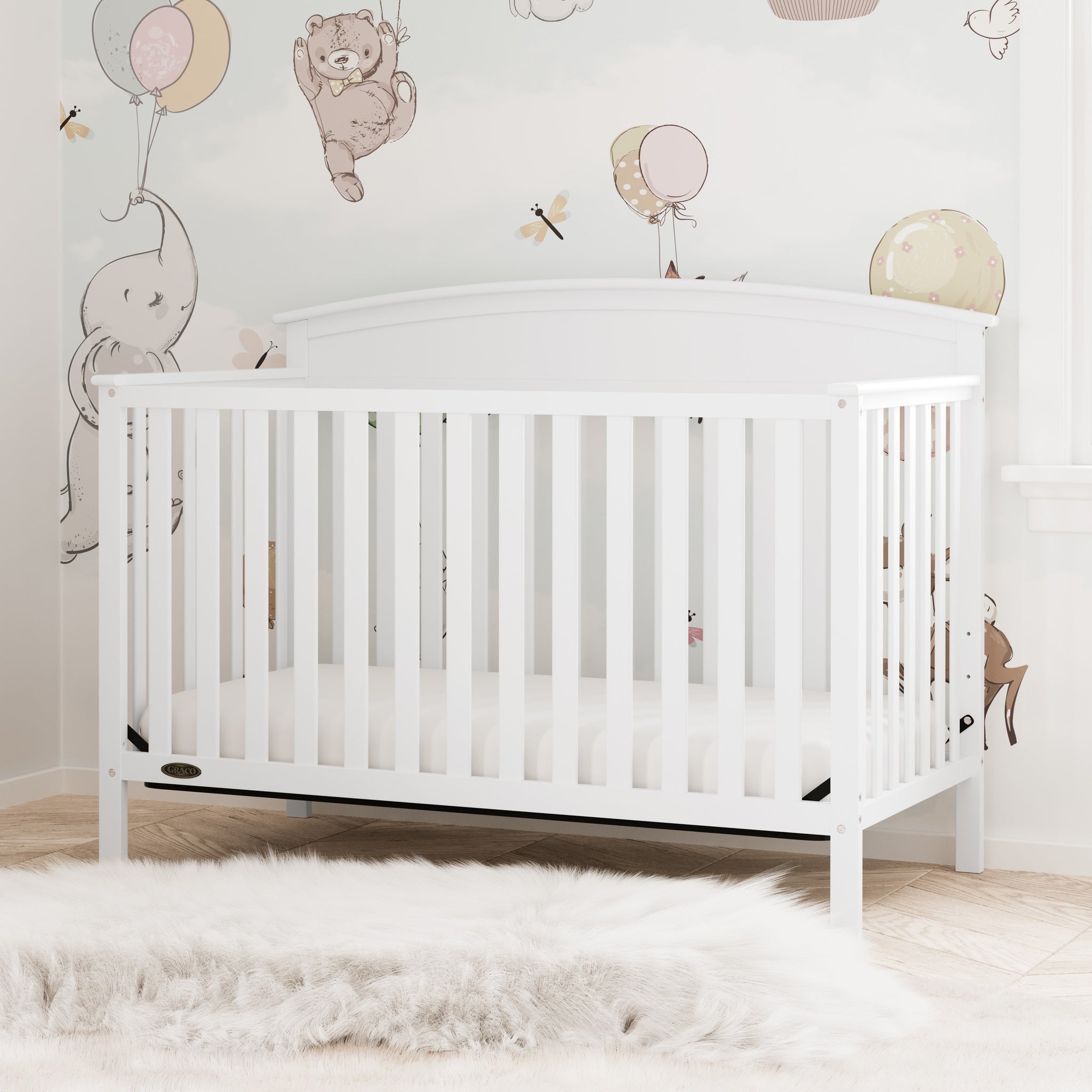 White crib in nursery